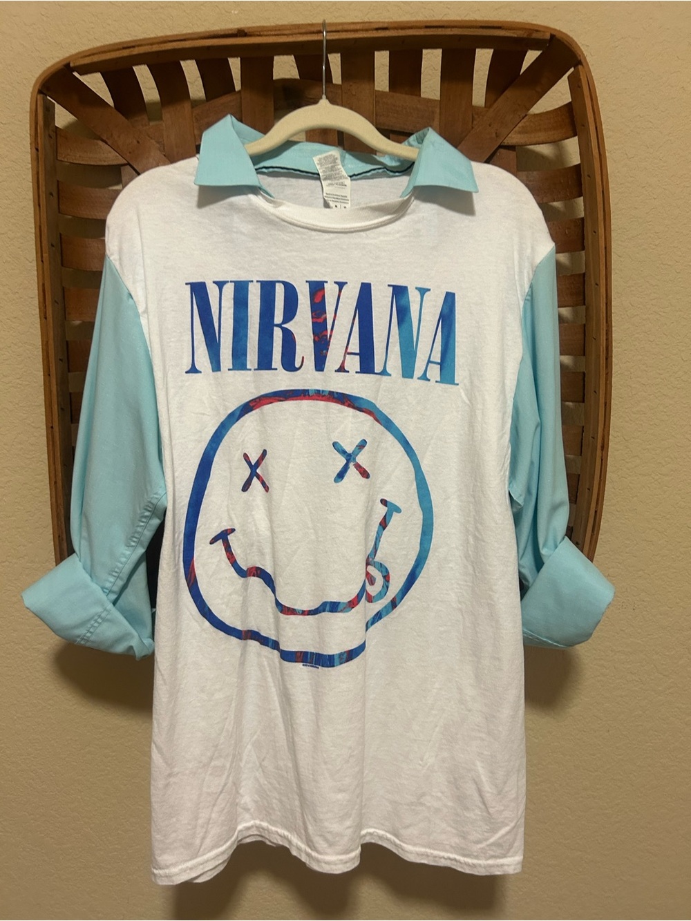 NIRVANA White Tee with Light Blue Smiley Graphic
